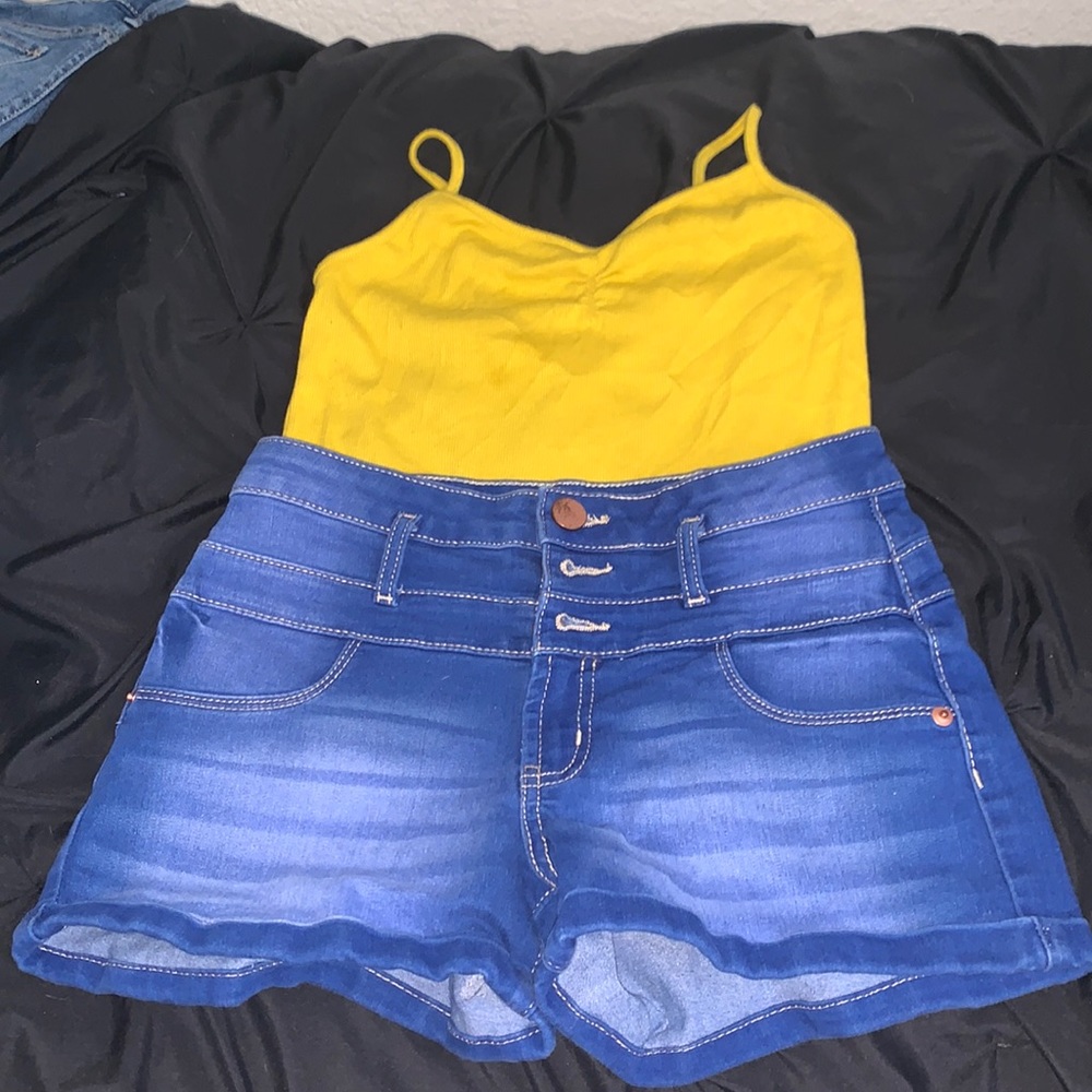 Yellow tank top/ blue shorts